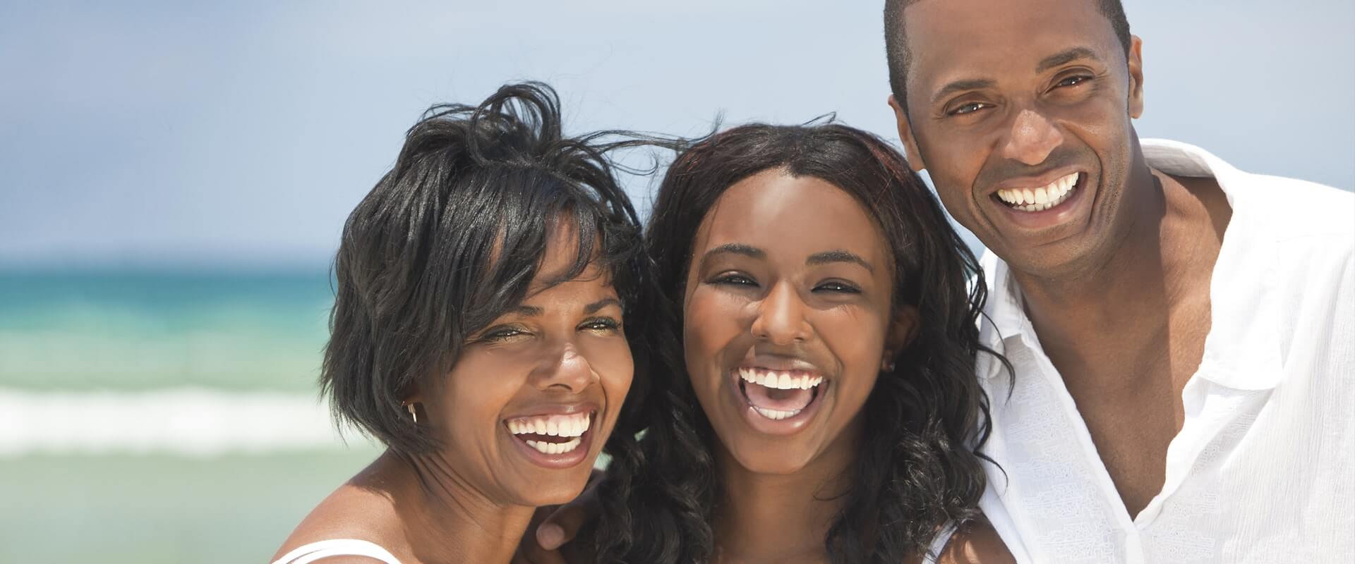 A happy smiling laughing African American family stock photo